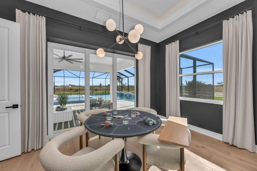 Furnished interior in a model home at Hampton Lakes in Sarasota (Image 173).