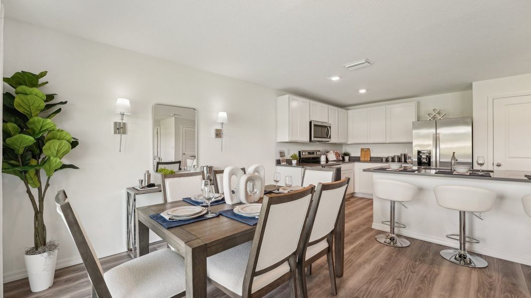 Furnished interior in a model home at Sunset Hills in Summerfield (Image 22).