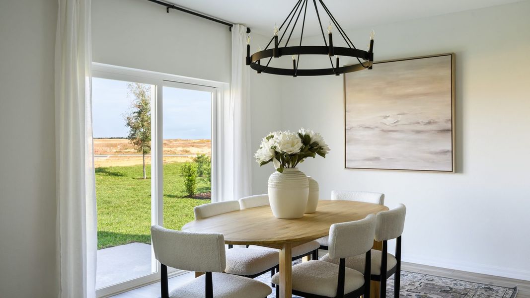 Furnished interior in a model home at Bellehaven in Belleview (Image 5).