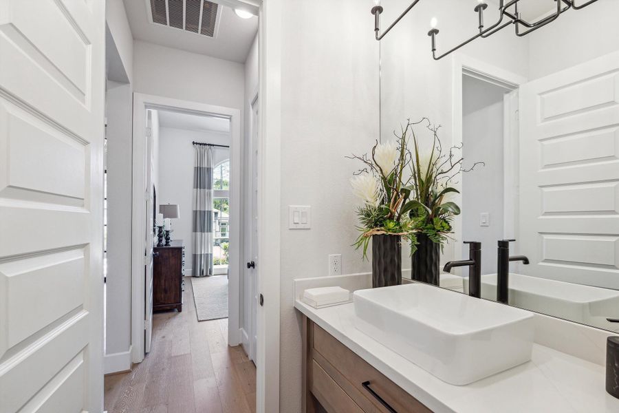 Furnished interior in a model home at The Woodlands Hills – 65' in Willis (Image 17). Furnished interior in a model home at The Woodlands Hills – 65' in Willis (Image 17).