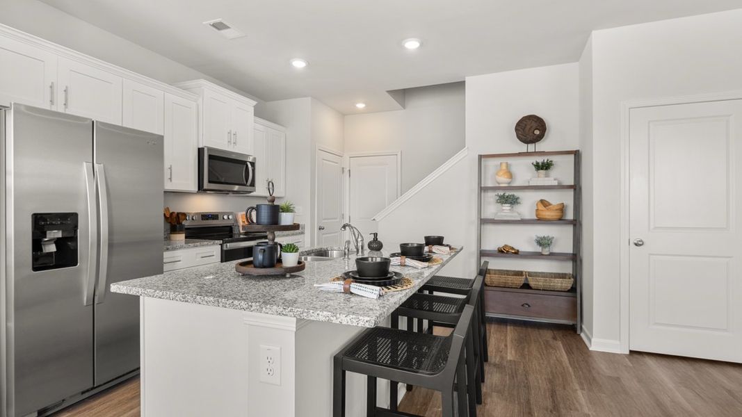 Furnished interior in a model home at Rushing Waters Townhomes in North Augusta (Image 4).