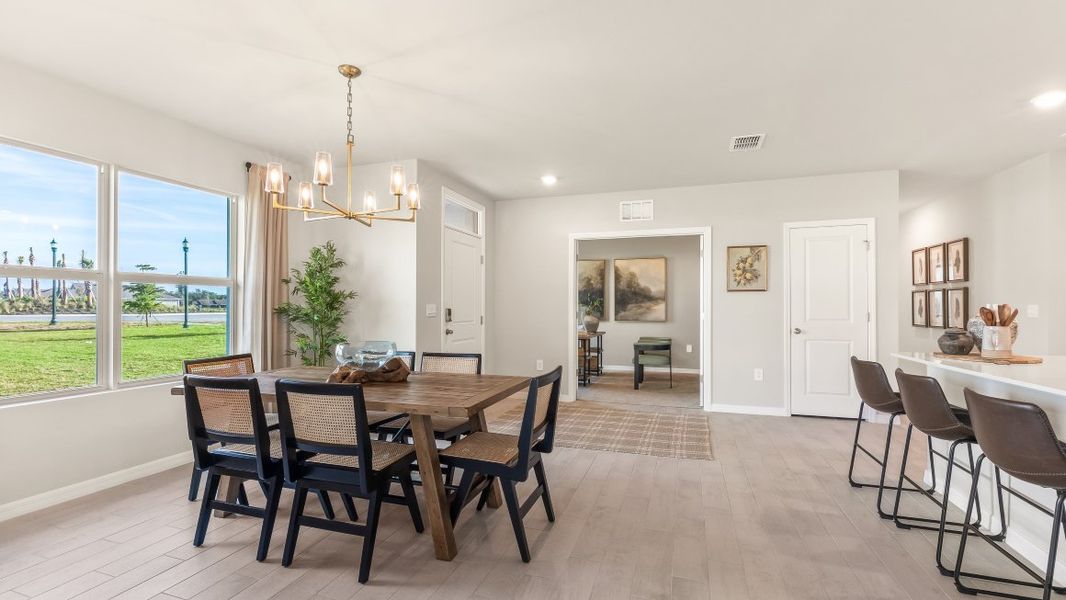 Furnished interior in a model home at Central Parc in North Port (Image 20).