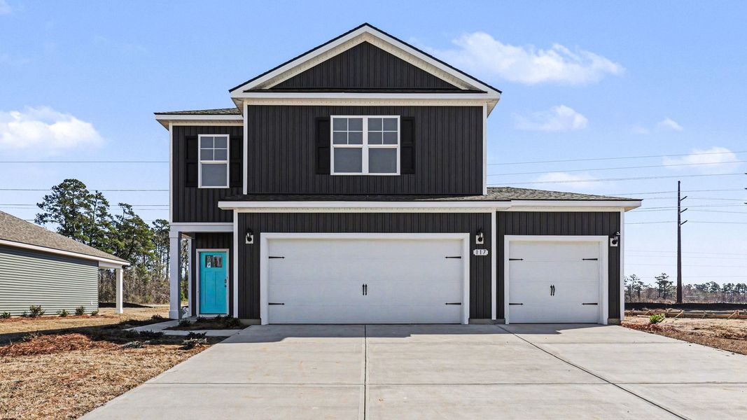 Front exterior of a home in the Winfield Farms community, located in Myrtle Beach, SC (Image 17).