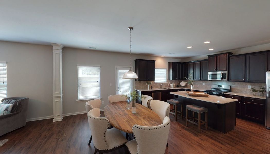 Furnished interior in a model home at North Village in Rydal (Image 17).