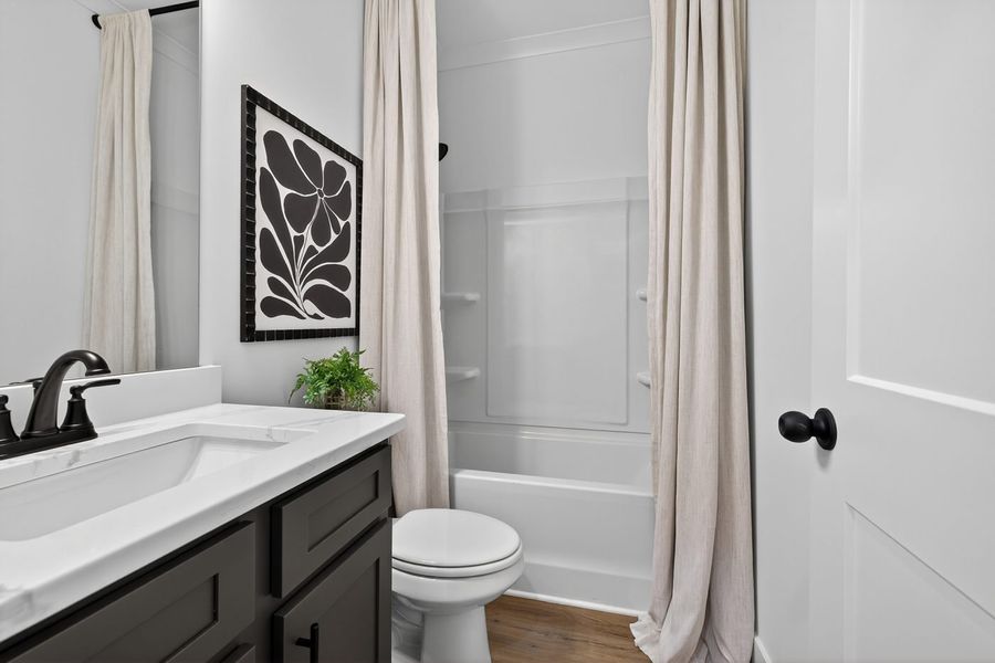 Furnished interior in a model home at Alcovy Overlook in Dacula (Image 4).