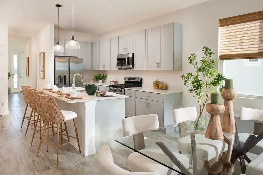 Furnished interior in a model home at Highfield at Twisted Oaks in Wildwood (Image 5).