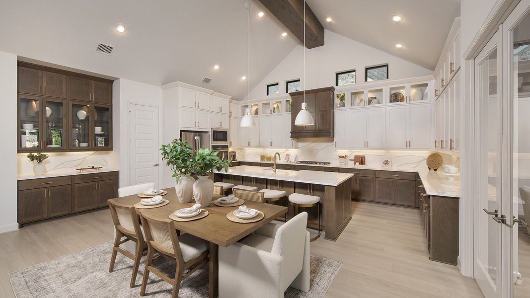 Furnished interior in a model home at The Highlands 65' in Porter (Image 15).