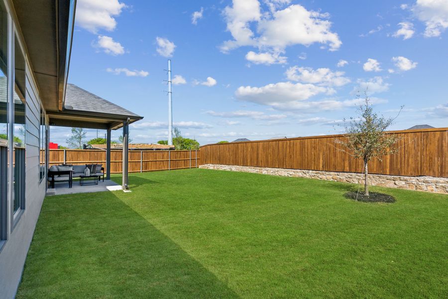 Covered Patio in the Winters model home in Gunter TX by Trophy Signature Homes