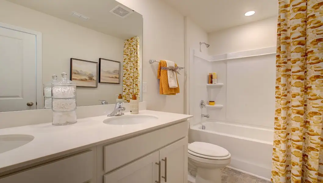 Furnished interior in a model home at Wildbrook Village Townhomes in Waynesville (Image 5).