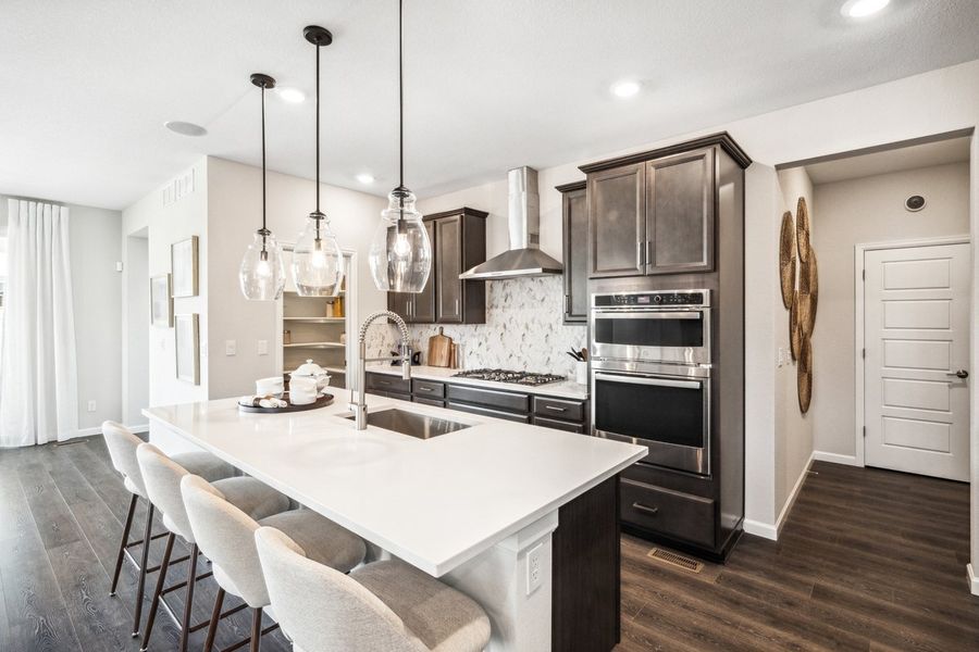Furnished interior in a model home at The Aurora Highlands Landmark Collection in Aurora (Image 20).