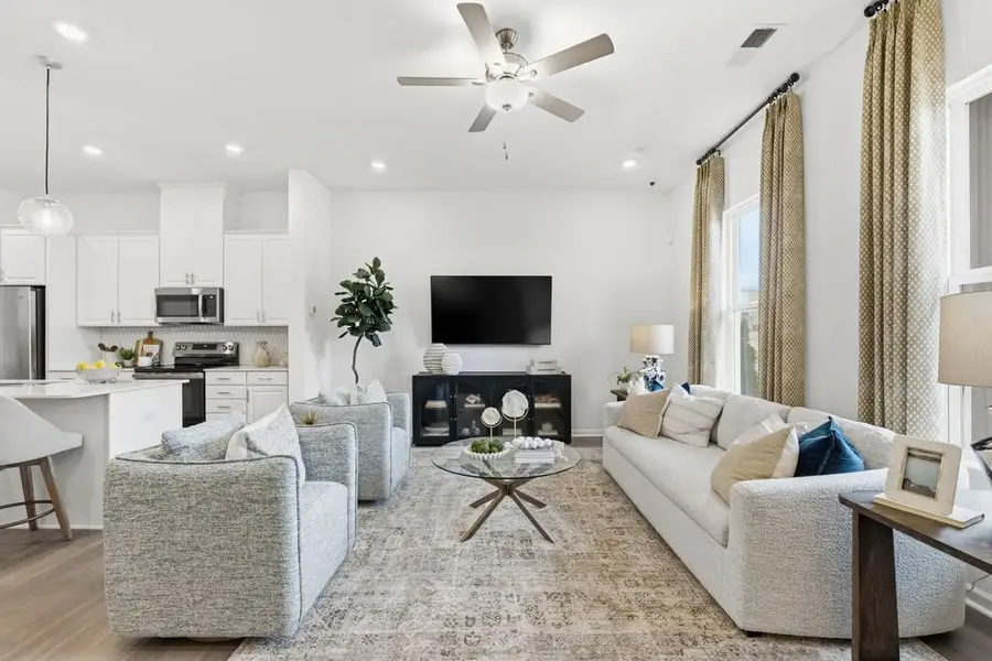 Furnished interior in a model home at Terraces at the Exchange in Indian Land (Image 4).
