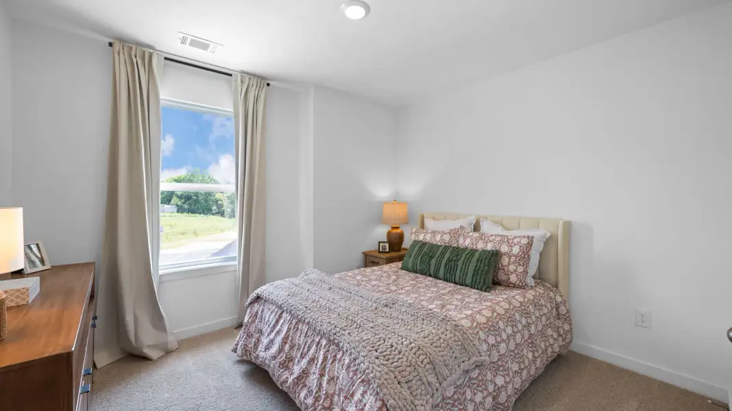 Furnished interior in a model home at The Eleuthera in Chattanooga (Image 18).