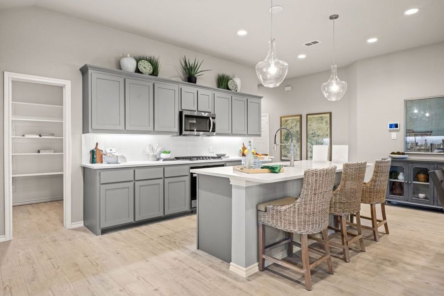 Furnished interior in a model home at Myrtle Creek in Waxahachie (Image 11).