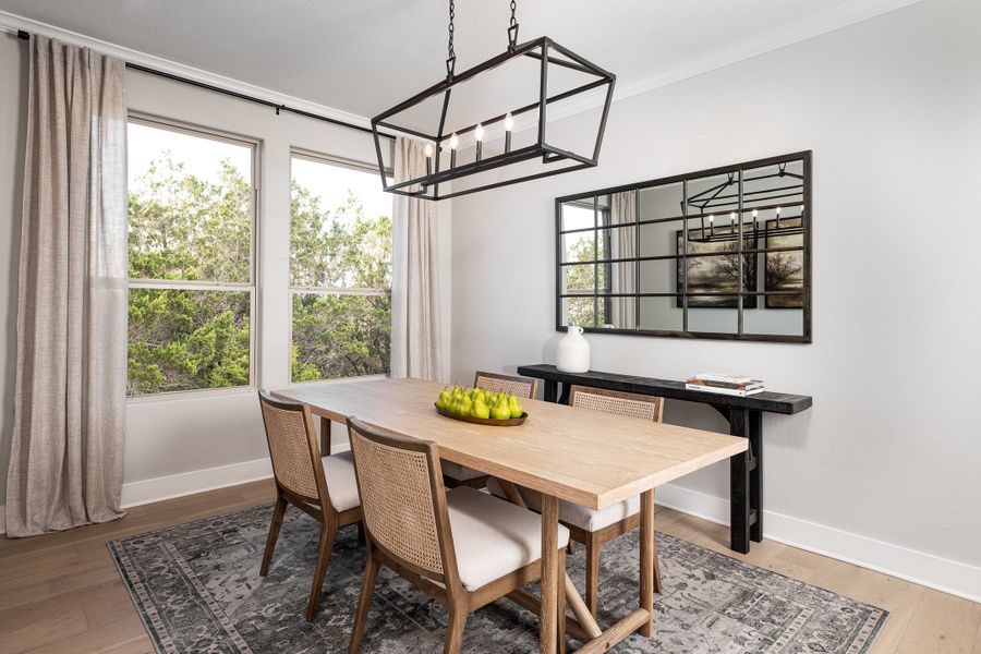 Furnished interior in a model home at Megan's Landing 50's in Castroville (Image 4).