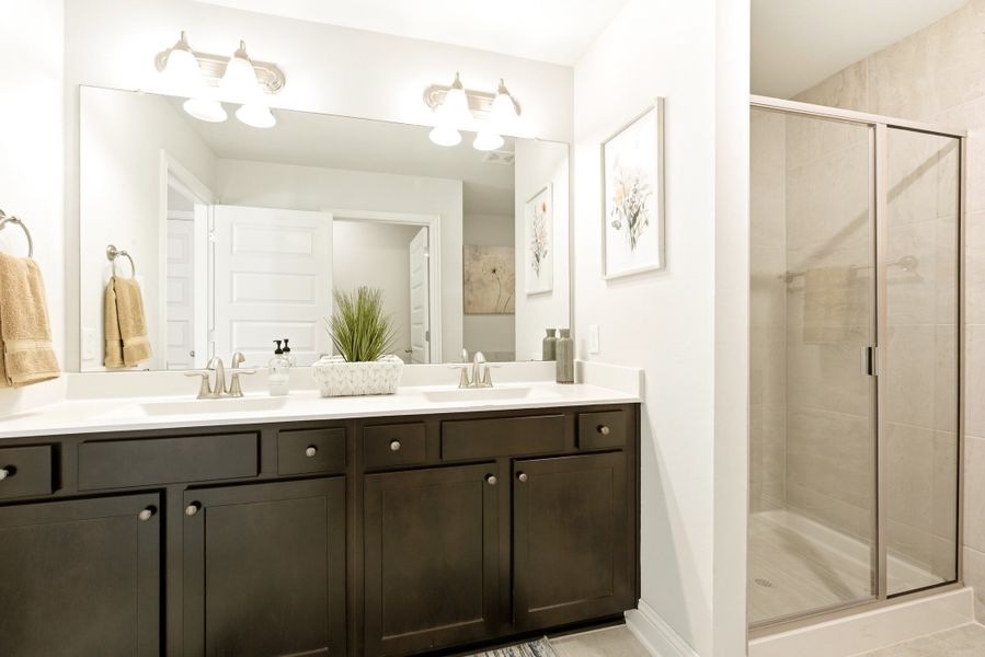 Furnished interior in a model home at Kiber Reserve in Angleton (Image 23).