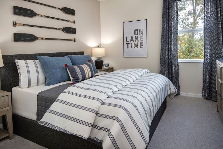 Furnished interior in a model home at Mirror Lake Village in Fruitland Park (Image 35).