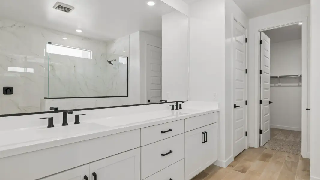 Furnished interior in a model home at Oak Park Manor Signature Homesites in Phoenix (Image 13).