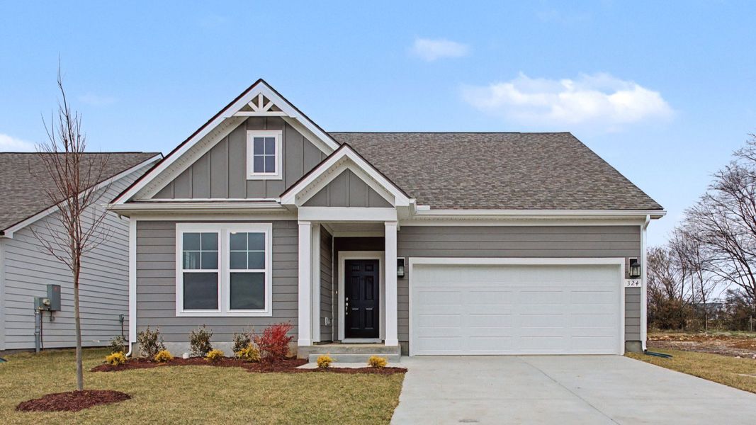 Front exterior of a home in the Cottages of Bearwood community, located in Mount Pleasant, TN (Image 2).