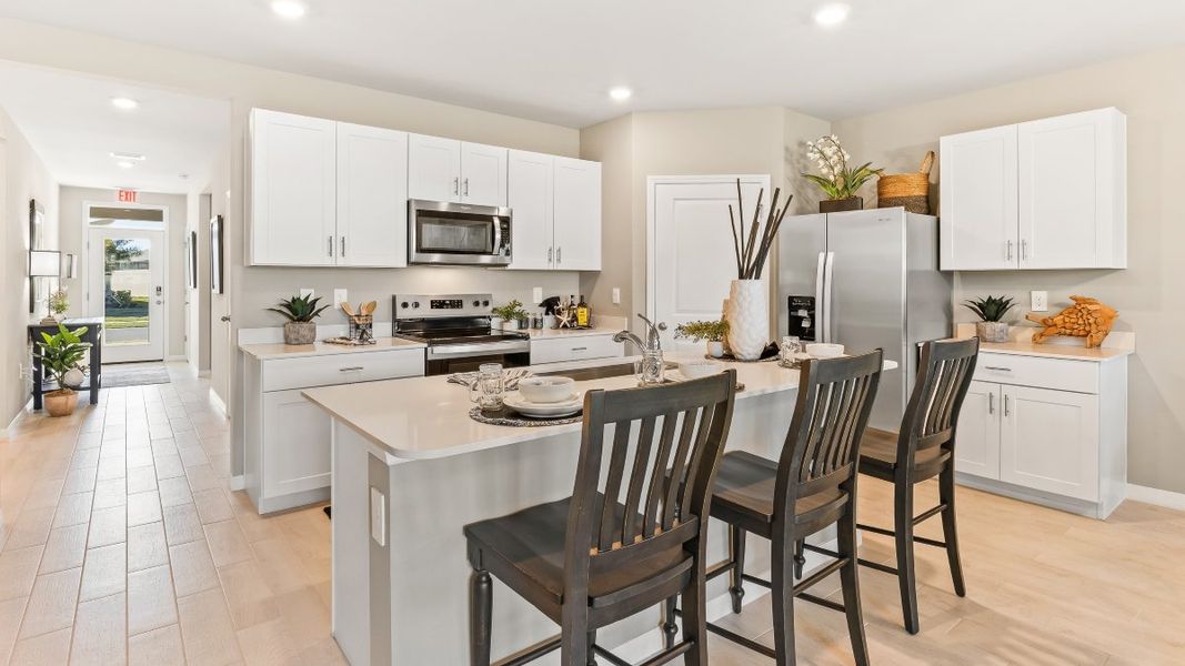 Furnished interior in a model home at Cove at West Port - Tradition in Port Charlotte (Image 7).