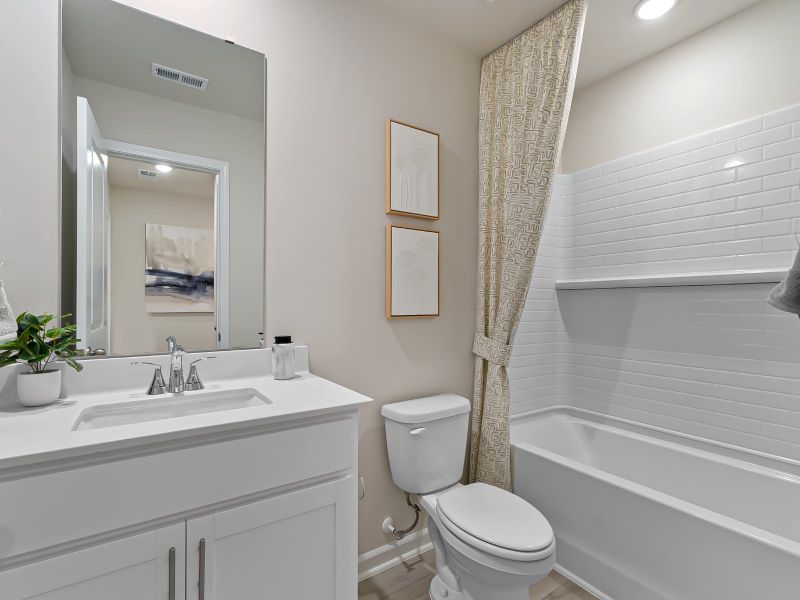 Furnished interior in a model home at The Rows at Buffaloe Reserve in Raleigh (Image 23).