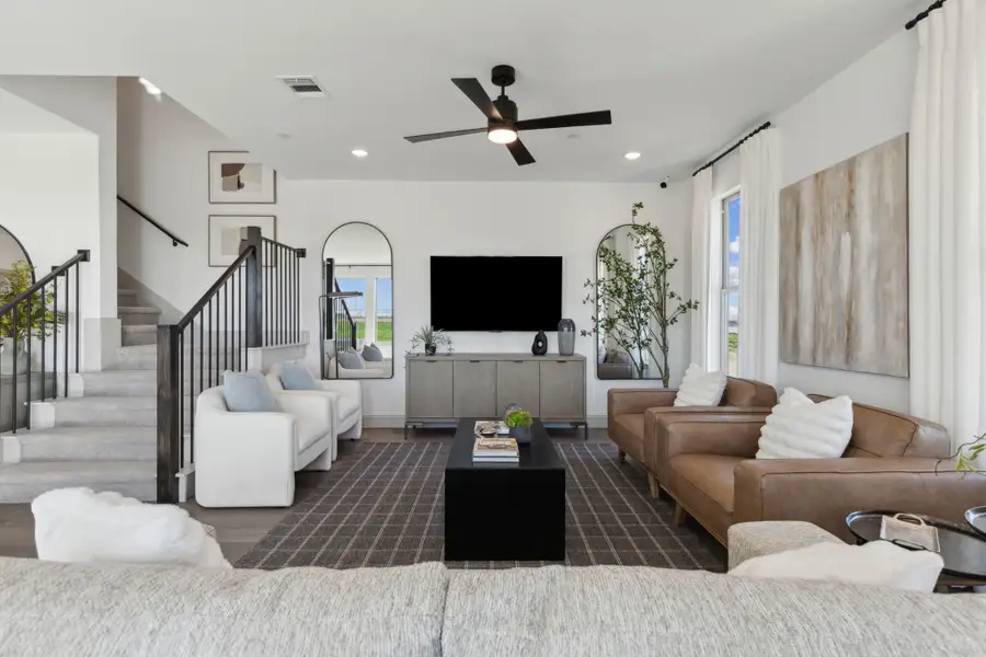 Furnished interior in a model home at The Village at Midtowne in Midlothian (Image 3).