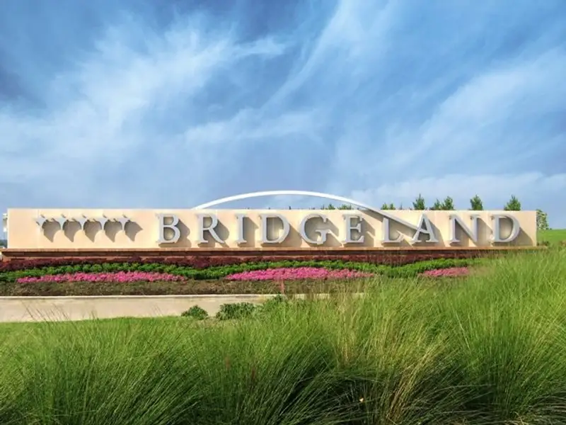 Entrance to the Bridgeland community in Cypress, TX, featuring signage and landscaping (Image 1). Entrance to the Bridgeland community in Cypress, TX, featuring signage and landscaping (Image 1).