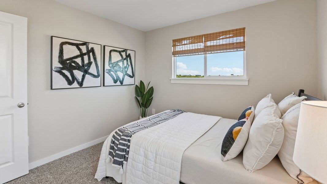 Furnished interior in a model home at Frontier in Mustang Ridge (Image 27).
