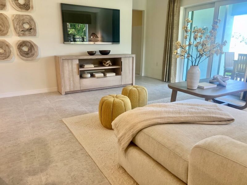 Furnished interior in a model home at Richmond Cove in Palm Bay (Image 27).