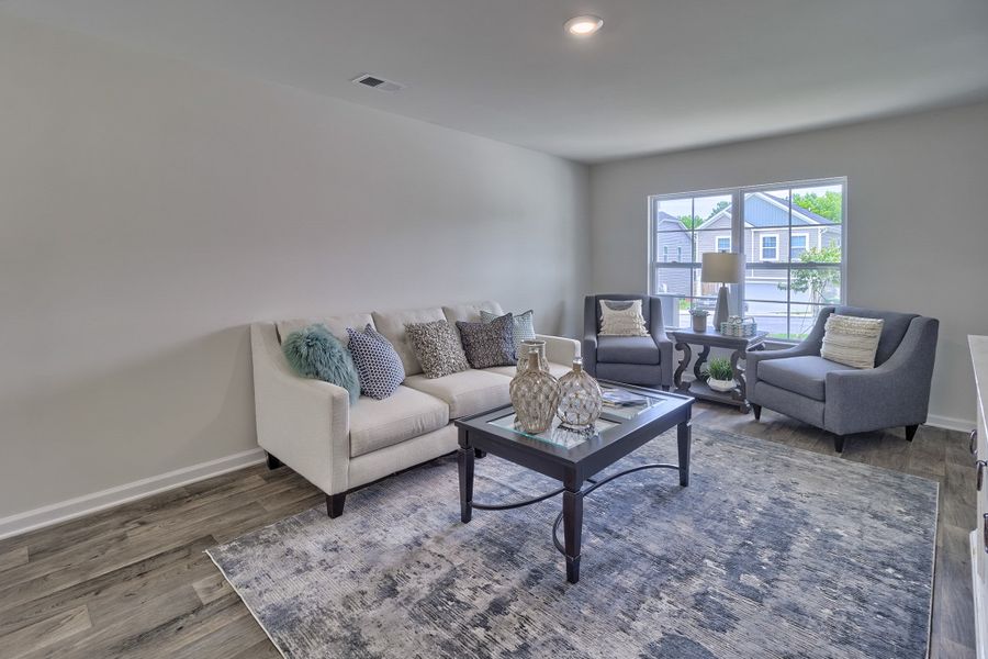 Furnished interior in a model home at Hunters Branch in Hopkins (Image 7).