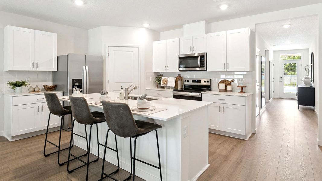 Furnished interior in a model home at Harmony West in St. Cloud (Image 7).