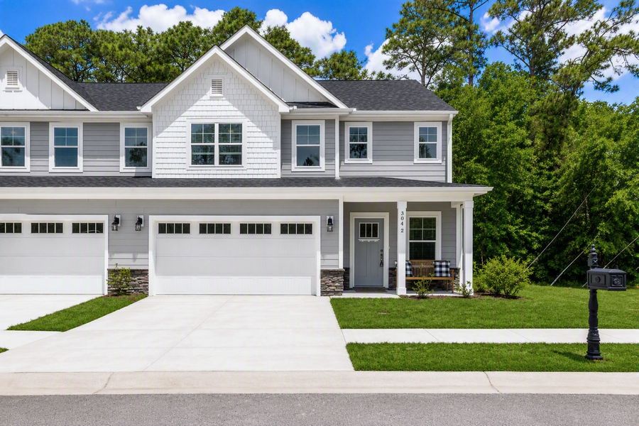Front exterior of a home in the Rourk Woods community, located in Shallotte, NC (Image 3).