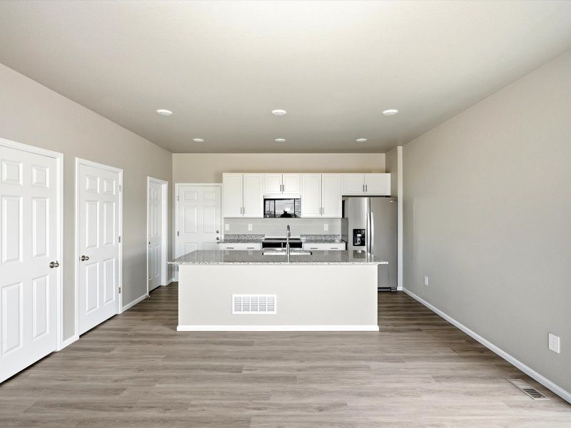 Furnished interior in a model home at York Station in Thornton (Image 3).