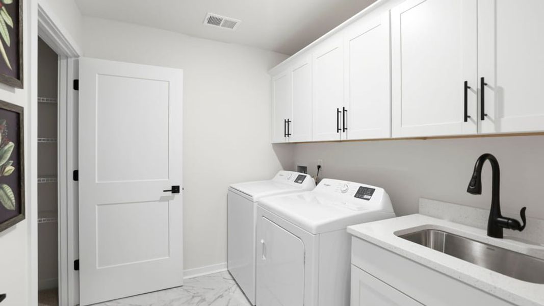 Furnished interior in a model home at Sycamore Cove in Woodruff (Image 35).