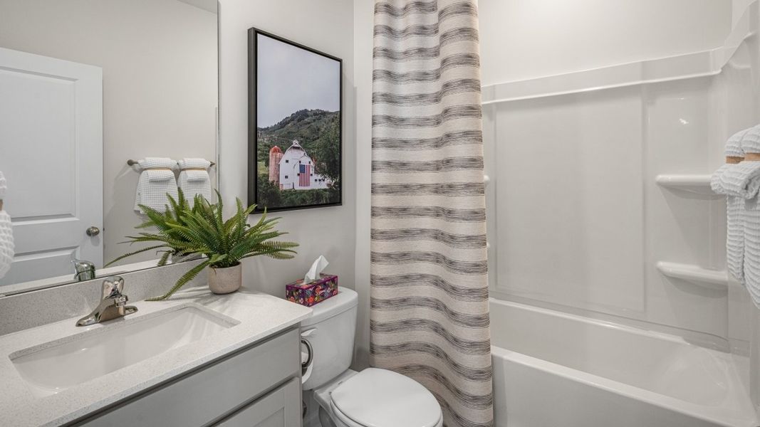 Furnished interior in a model home at The Estates at Edinborough in Gibsonville (Image 14).