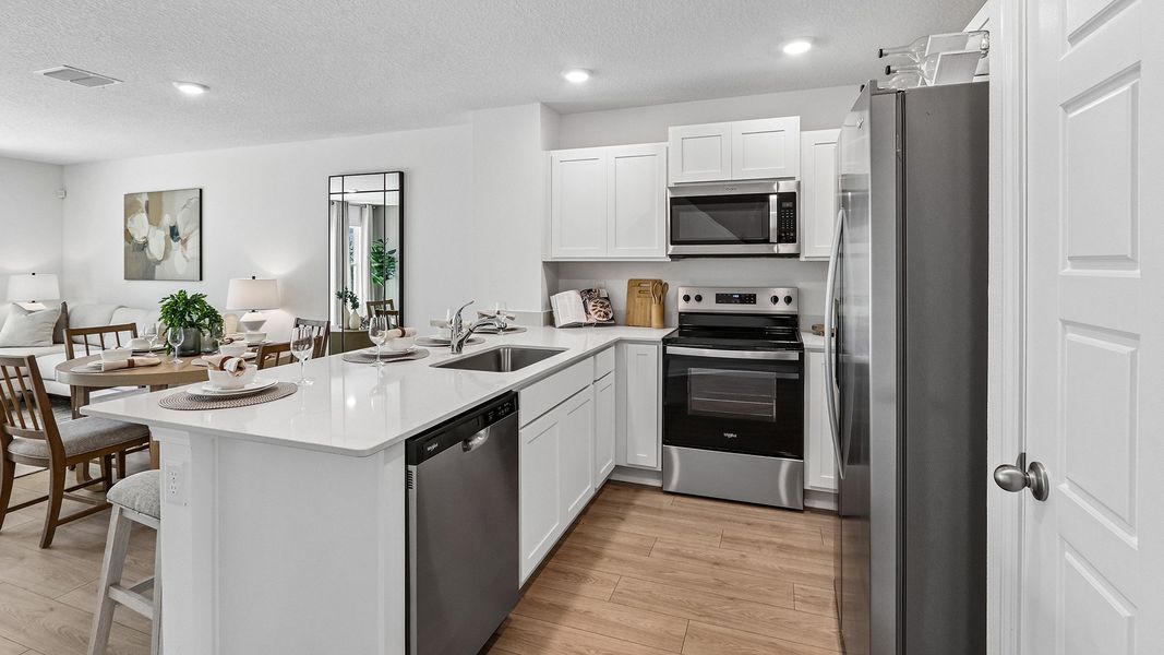 Furnished interior in a model home at Corsair in Middleburg (Image 9).
