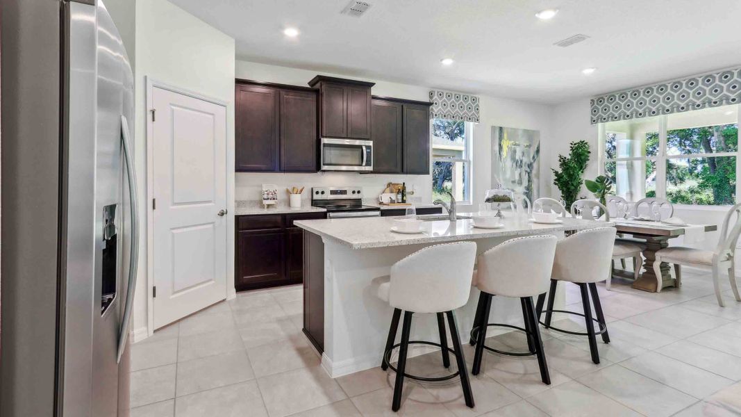 Furnished interior in a model home at Mockingbird Reserve at Winding Oaks in Ocala (Image 3).