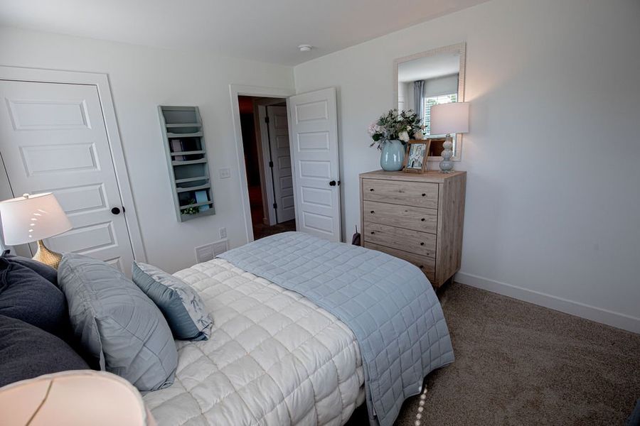 Furnished interior in a model home at The Townhomes at Union Depot in Bartlett (Image 35).