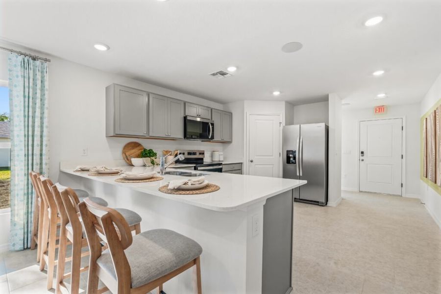 Furnished interior in a model home at Spanish Lakes in Port St. Lucie (Image 18).