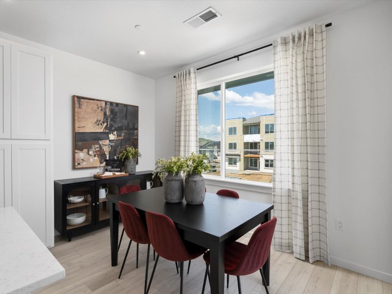 Furnished interior in a model home at Lyric at RidgeGate Townhomes in Lone Tree (Image 13).