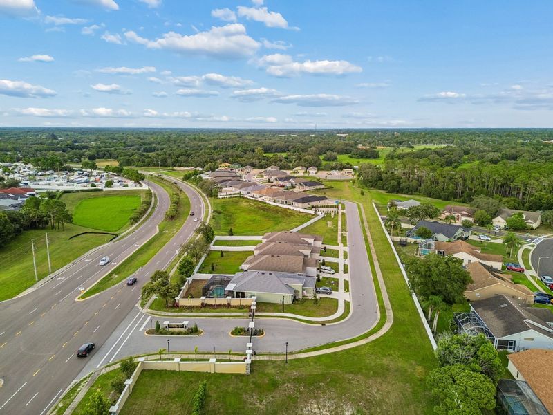 Aerial view of the Highland Hills community in Hudson, FL, showing layout and nearby surroundings (Image 10).