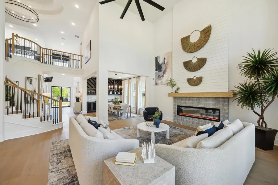 Furnished interior in a model home at Audubon - 70' in Magnolia (Image 7).