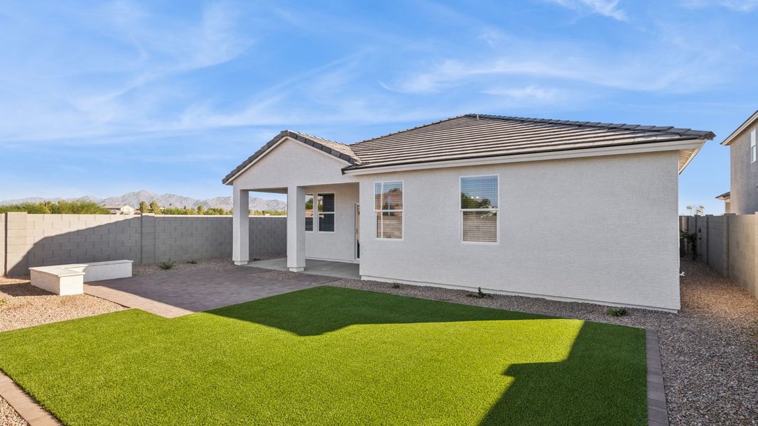 Front exterior of a home in the Del Rio Ranch community, located in Avondale, AZ (Image 13).