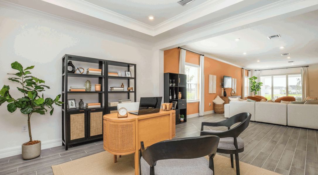 Furnished interior in a model home at Heritage Station in Punta Gorda (Image 5).