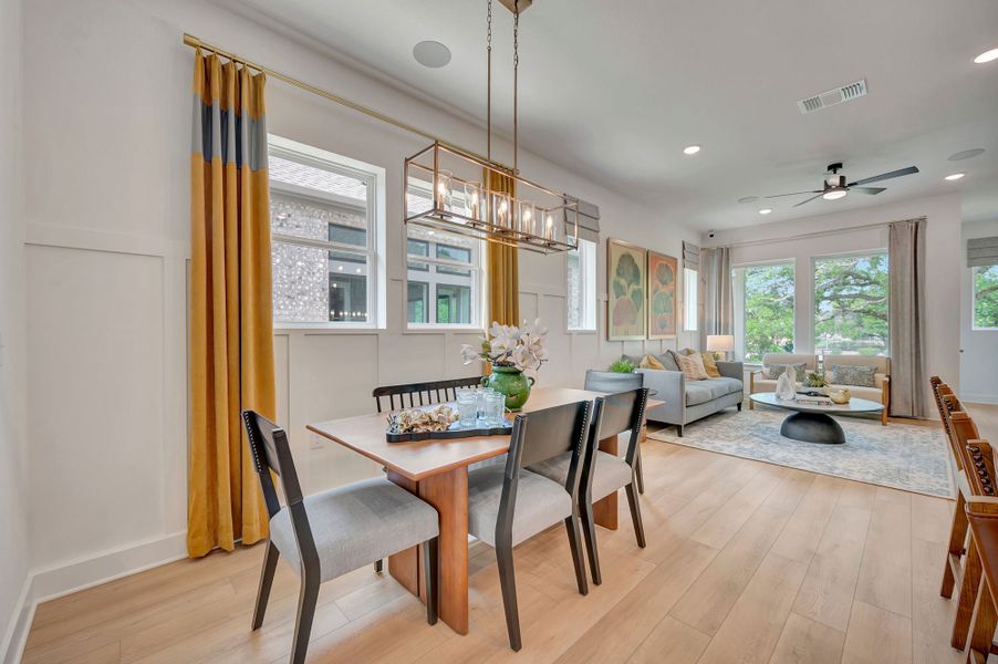 Furnished interior in a model home at Kissing Tree – Grove Series in San Marcos (Image 8).