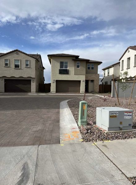 Modern two-story residences with stone accents in Avalon Crossing Inspiration by Lennar (Mesa, AZ). Modern two-story residences with stone accents in Avalon Crossing Inspiration by Lennar (Mesa, AZ).