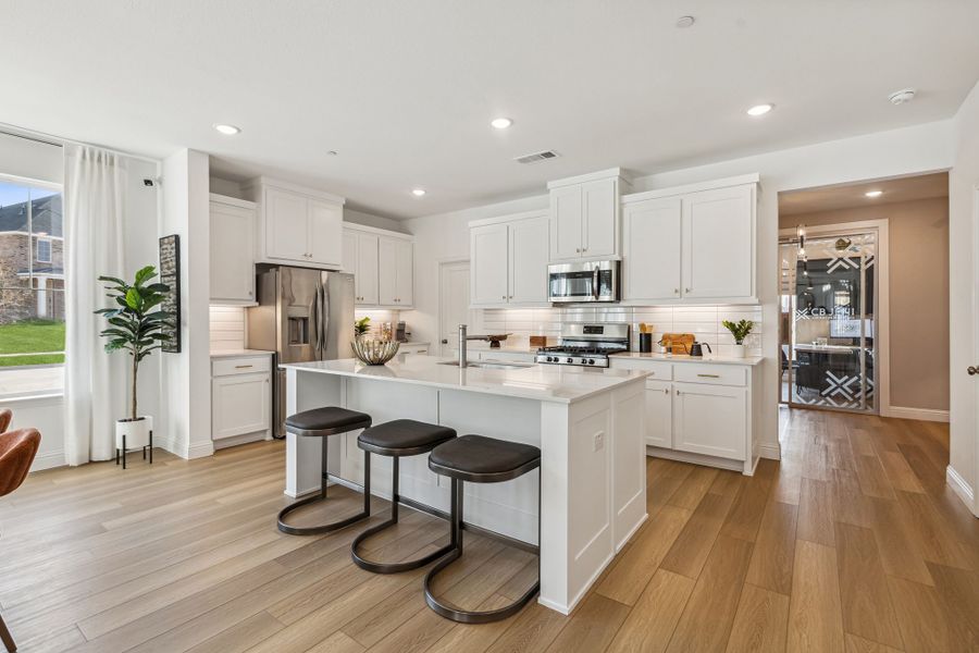Furnished interior in a model home at Village on Main Street in Frisco (Image 24).