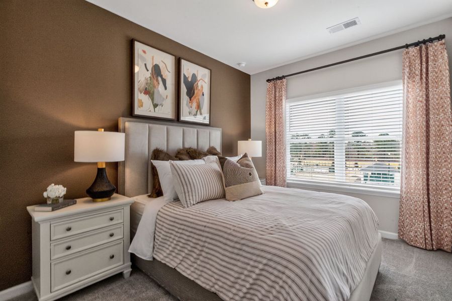 Furnished interior in a model home at The Townes at Cape Overlook in Lillington (Image 15). Furnished interior in a model home at The Townes at Cape Overlook in Lillington (Image 15).