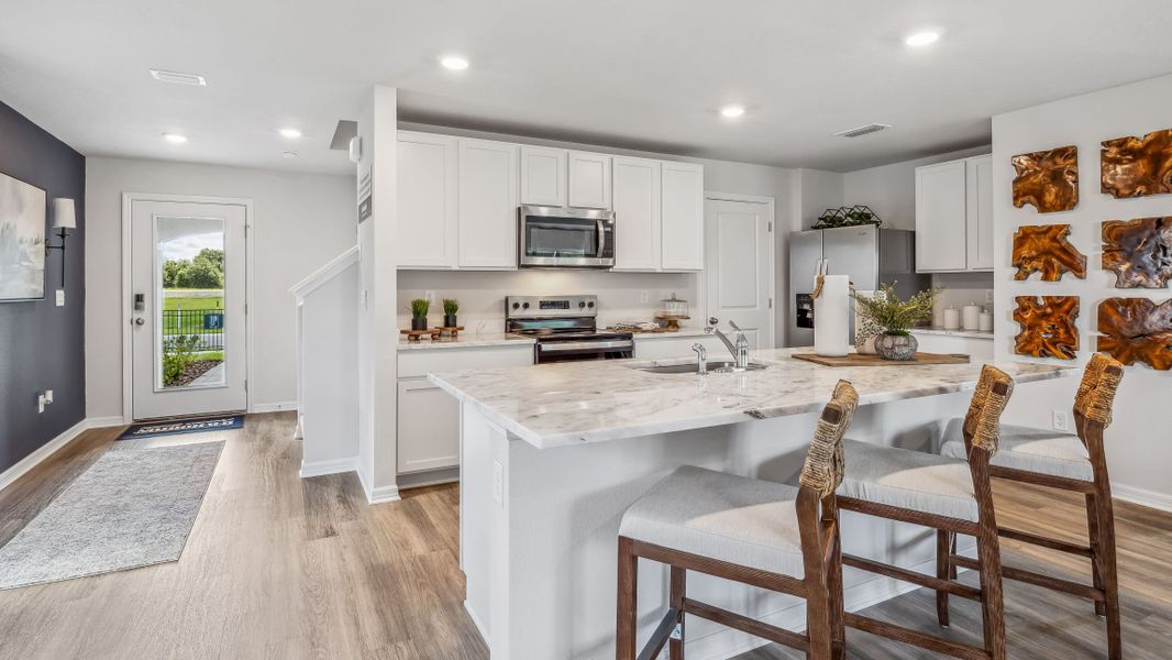 Furnished interior in a model home at Bella Lago in Parrish (Image 7).