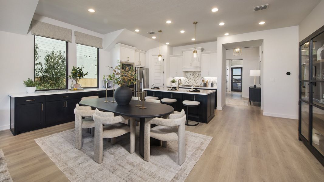 Furnished interior in a model home at Lariat 60' in Liberty Hill (Image 9).