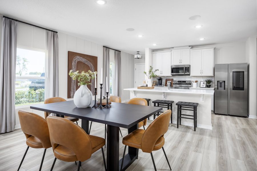 Furnished interior in a model home at Thompson Village Townhomes in Apopka (Image 12).